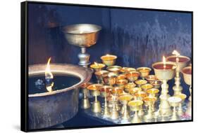 Votive candles, Boudhanath Stupa, UNESCO World Heritage Site, Kathmandu, Nepal, Asia-G&M Therin-Weise-Framed Stretched Canvas