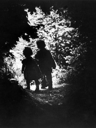 Children of Photographer with Eugene Smith Walking Hand in Hand in Woods Behind His Home