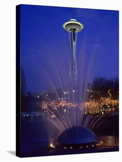 Wa, Seattle, International Fountain with Holiday Lights and the Space Needle-Jamie And Judy Wild-Stretched Canvas