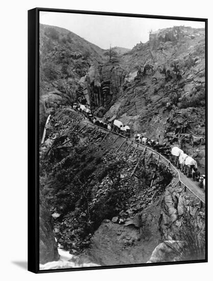 Wagon Train on Mountain Pass-null-Framed Stretched Canvas