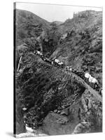 Wagon Train on Mountain Pass-null-Stretched Canvas