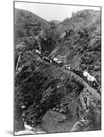 Wagon Train on Mountain Pass-null-Mounted Premium Photographic Print