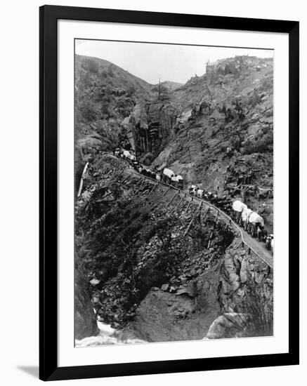 Wagon Train on Mountain Pass-null-Framed Photographic Print