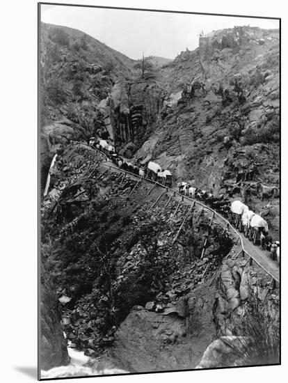 Wagon Train on Mountain Pass-null-Mounted Photographic Print