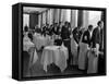 Waiters at the Grand Hotel Line Up at the Windows to Watch Sonja Henie Ice Skate Outside-Alfred Eisenstaedt-Framed Stretched Canvas