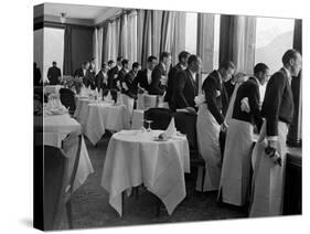 Waiters at the Grand Hotel Line Up at the Windows to Watch Sonja Henie Ice Skate Outside-Alfred Eisenstaedt-Stretched Canvas