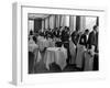 Waiters at the Grand Hotel Line Up at the Windows to Watch Sonja Henie Ice Skate Outside-Alfred Eisenstaedt-Framed Photographic Print