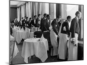 Waiters in the Grand Hotel Dining Room Lined Up at Window Watching Sonia Henie Ice Skating Outside-Alfred Eisenstaedt-Mounted Photographic Print