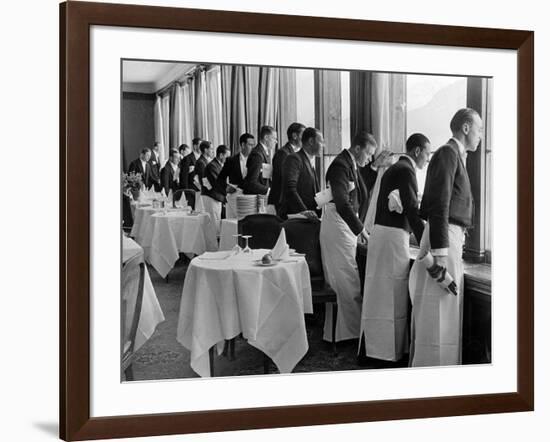 Waiters in the Grand Hotel Dining Room Lined Up at Window Watching Sonia Henie Ice Skating Outside-Alfred Eisenstaedt-Framed Photographic Print