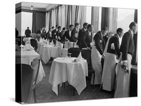 Waiters in the Grand Hotel Dining Room Lined Up at Window Watching Sonja Henie Ice Skating Outside-Alfred Eisenstaedt-Stretched Canvas