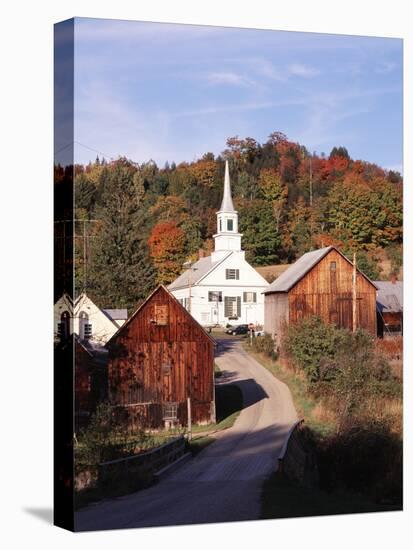 Waits River, View of Church and Barn in Autumn, Northeast Kingdom, Vermont, USA-Walter Bibikow-Stretched Canvas