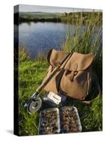 Wales, Conwy, A Trout Rod and Fly Fishing Equipment Beside a Hill Lake in North Wales, UK-John Warburton-lee-Stretched Canvas