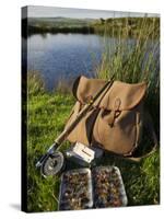 Wales, Conwy, A Trout Rod and Fly Fishing Equipment Beside a Hill Lake in North Wales, UK-John Warburton-lee-Stretched Canvas