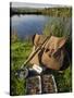 Wales, Conwy, A Trout Rod and Fly Fishing Equipment Beside a Hill Lake in North Wales, UK-John Warburton-lee-Stretched Canvas