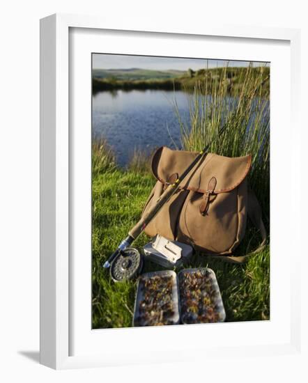 Wales, Conwy, A Trout Rod and Fly Fishing Equipment Beside a Hill Lake in North Wales, UK-John Warburton-lee-Framed Photographic Print