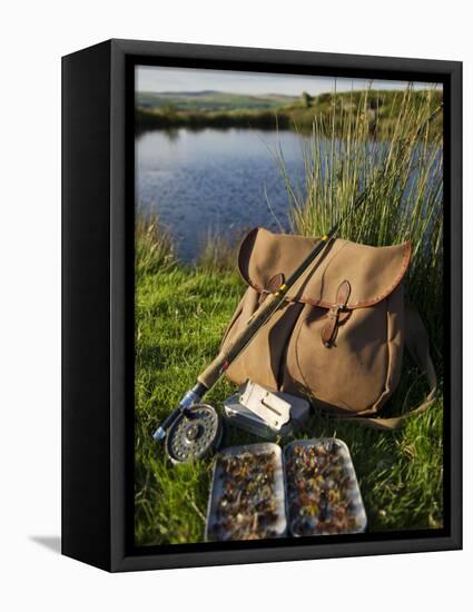 Wales, Conwy, A Trout Rod and Fly Fishing Equipment Beside a Hill Lake in North Wales, UK-John Warburton-lee-Framed Stretched Canvas