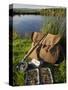 Wales, Conwy, A Trout Rod and Fly Fishing Equipment Beside a Hill Lake in North Wales, UK-John Warburton-lee-Stretched Canvas