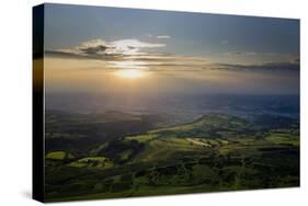 Wales landscape with setting sun-Charles Bowman-Stretched Canvas
