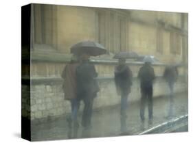 Walking in the rain, Oxford University, England-Alan Klehr-Stretched Canvas