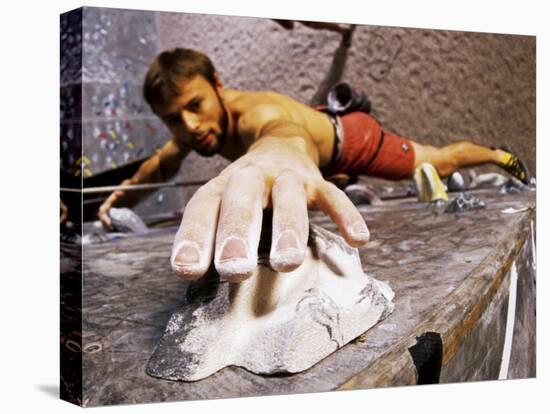 Wall Climber Reaches for a Grip, Colorado, USA-null-Stretched Canvas