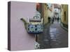 Wall Decorated with Teapot and Cobbled Street in the Old Town, Vilnius, Lithunia-Keren Su-Stretched Canvas