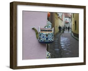 Wall Decorated with Teapot and Cobbled Street in the Old Town, Vilnius, Lithunia-Keren Su-Framed Photographic Print