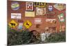 Wall of Advertising Signs, Erick, Oklahoma, USA-Walter Bibikow-Mounted Photographic Print