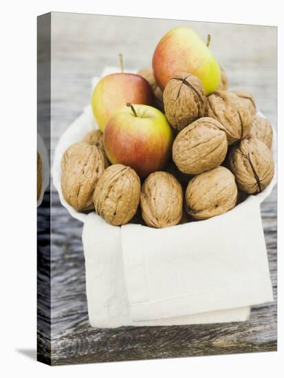 Walnuts and Apples on Cloth in White Bowl-null-Stretched Canvas