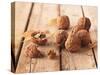 Walnuts on a Wooden Background-Matthias Hoffmann-Stretched Canvas