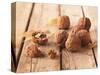 Walnuts on a Wooden Background-Matthias Hoffmann-Stretched Canvas