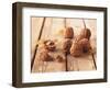 Walnuts on a Wooden Background-Matthias Hoffmann-Framed Photographic Print