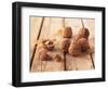 Walnuts on a Wooden Background-Matthias Hoffmann-Framed Photographic Print