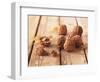 Walnuts on a Wooden Background-Matthias Hoffmann-Framed Photographic Print