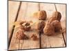 Walnuts on a Wooden Background-Matthias Hoffmann-Mounted Photographic Print