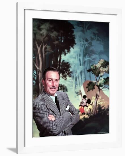 Walt Disney Posing Against Landscape Backdrop Containing Mickey Mouse-Alfred Eisenstaedt-Framed Premium Photographic Print