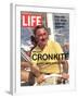 Walter Cronkite at Wheel of Boat, March 26, 1971-Leonard Mccombe-Framed Photographic Print