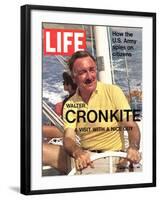 Walter Cronkite at Wheel of Boat, March 26, 1971-Leonard Mccombe-Framed Photographic Print