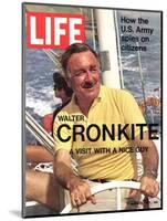 Walter Cronkite at Wheel of Boat, March 26, 1971-Leonard Mccombe-Mounted Photographic Print