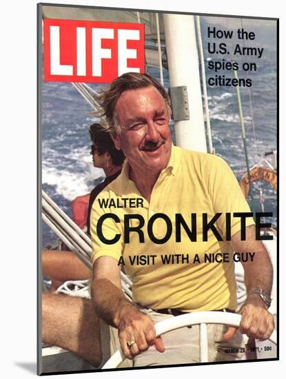 Walter Cronkite at Wheel of Boat, March 26, 1971-Leonard Mccombe-Mounted Photographic Print