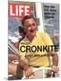 Walter Cronkite at Wheel of Boat, March 26, 1971-Leonard Mccombe-Mounted Photographic Print