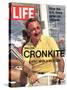 Walter Cronkite at Wheel of Boat, March 26, 1971-Leonard Mccombe-Stretched Canvas