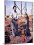 War Worker Holding Red Hot Metal Piece with Tongs at Shipyard-George Strock-Mounted Photographic Print