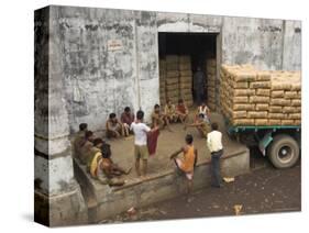 Warehouse Workers Having Rest Break at Carrit Moran & Company's Tea Warehouses at Kolkata Port-Eitan Simanor-Stretched Canvas