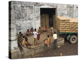Warehouse Workers Having Rest Break at Carrit Moran & Company's Tea Warehouses at Kolkata Port-Eitan Simanor-Stretched Canvas