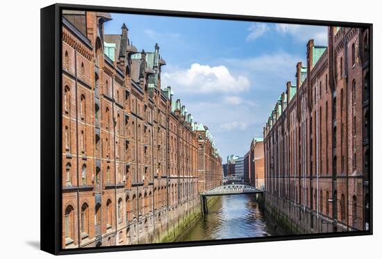 Warehouses in Speicherstadt in Hamburg, Germany-Jorg Hackemann-Framed Stretched Canvas