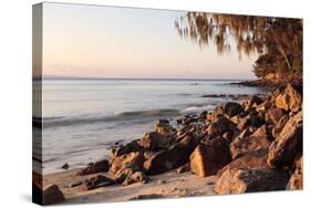 Warm Glow of Sunset on a Boulder-Strewn Beach on Noosa Heads, the Sunshine Coast, Queensland-William Gray-Stretched Canvas