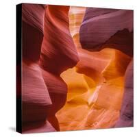 Warm Light Glowing on the Sandstone Walls of Lower Antelope Canyon Near Page, Arizona-John Lambing-Stretched Canvas