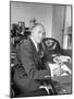 Warner Bros. Studio Chief Jack Warner Sitting at His Desk-Alfred Eisenstaedt-Mounted Photographic Print