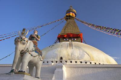 https://imgc.allpostersimages.com/img/posters/warrior-on-elephant-guards-the-north-side-of-boudhanath-stupa_u-L-PNEZZP0.jpg?artPerspective=n