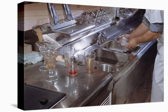 Washing Glasses at Diner-William P. Gottlieb-Stretched Canvas